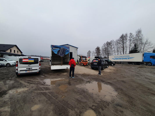 Members of the Rotaract Club of Klagenfurt-Wörthersee, Austria, collect medical supplies, food, sleeping bags, and generators for transport to the Polish-Ukrainian border to assist people displaced by conflict in Ukraine.