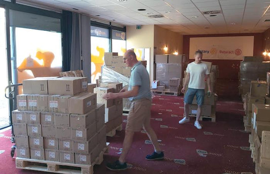 Rotary Members packing humanitarian aid for Ukraine